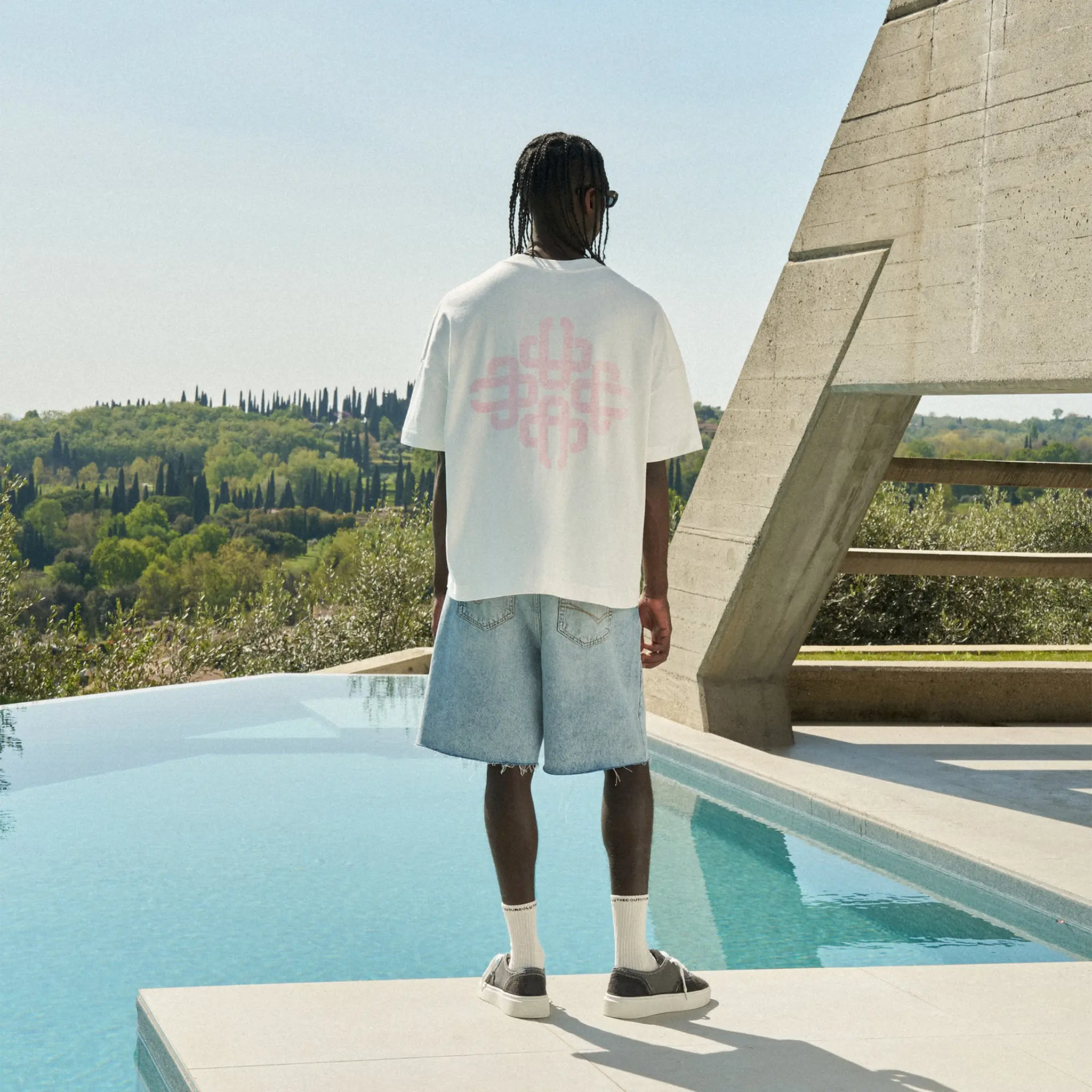 Back View of The Couture Club Emblem Reverse Print Pink T-Shirt